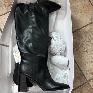 Sleek Black Leather Heeled Boots
